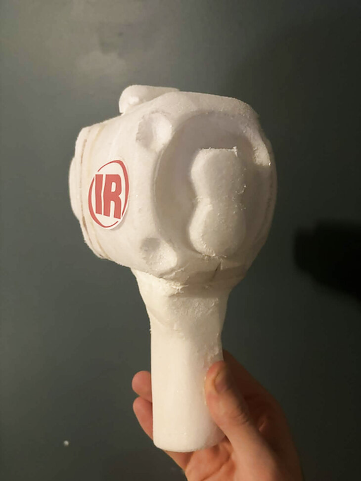 Foam model of the tool body held in hand, front view