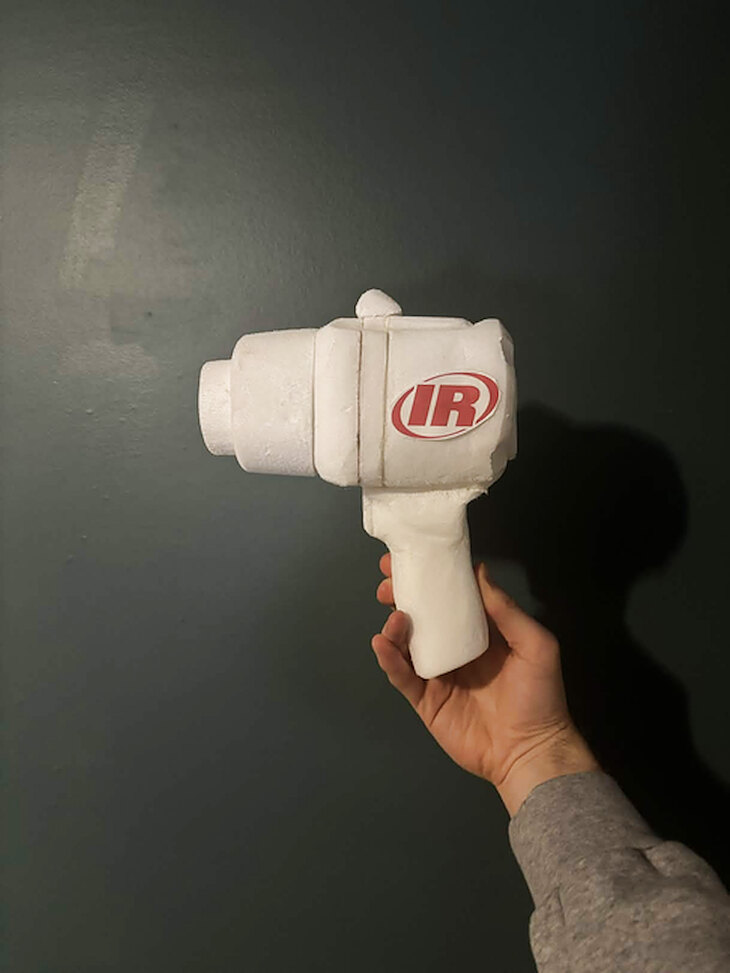 Foam model held in hand, side view