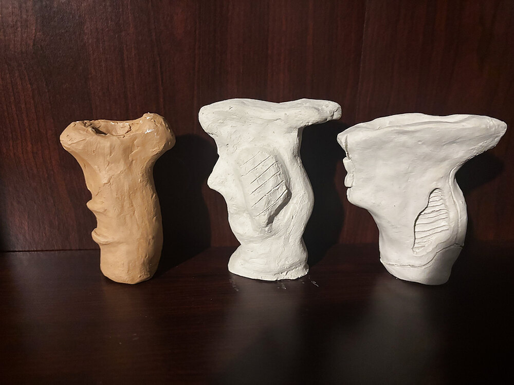 Three foam grip studies lined up on a table